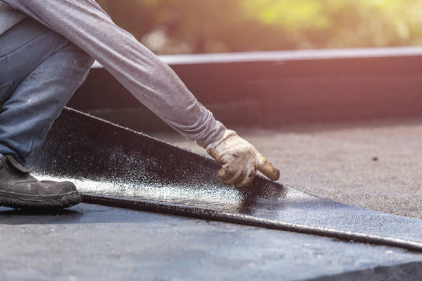 Professional Basement Waterproofing technician working in Stanton, KY